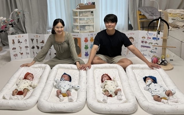 정재룡 LX하우시스 선임 부부와 네 쌍둥이./LX그룹